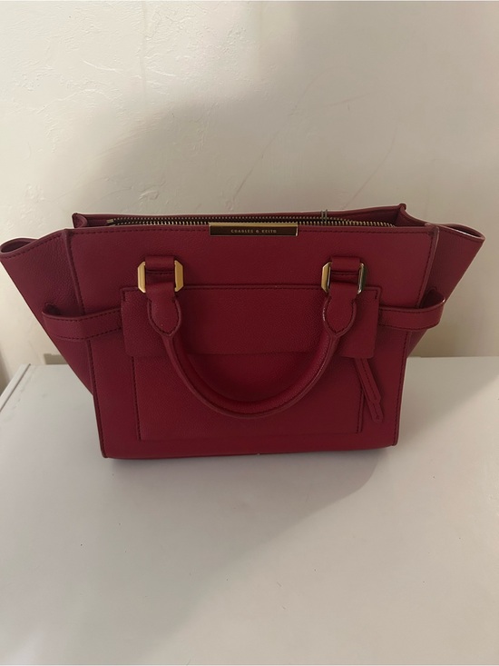 Charles & Keith Handbags - charles and Keith red handbag with gold accents